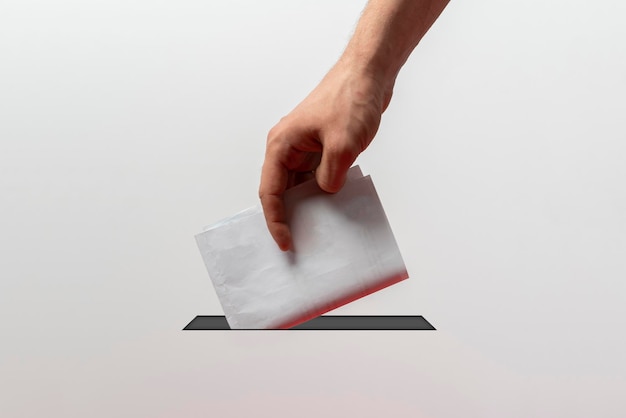 A person holding a paper bulletin and drop it in the urn minimalistic vote concept