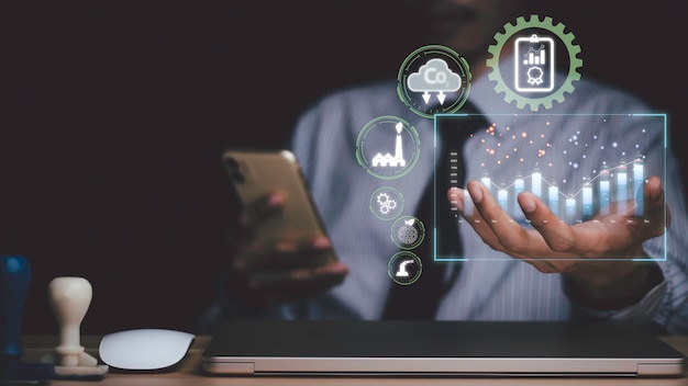 Person holding a tablet technology looking at the graph of pollution reduction or contaminants toxic substances in industrial plants to obtain an environmental certificatexD