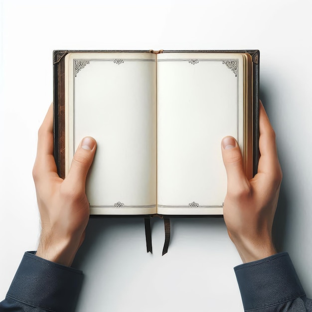 a person is holding a book with a hand holding a book with a floral design on the page