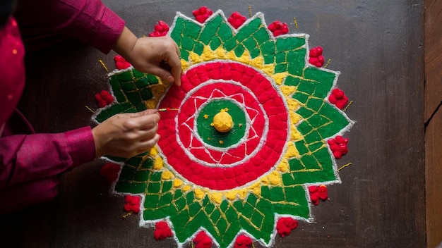 Photo a person is painting a design on a table that says quot the number 1 quot