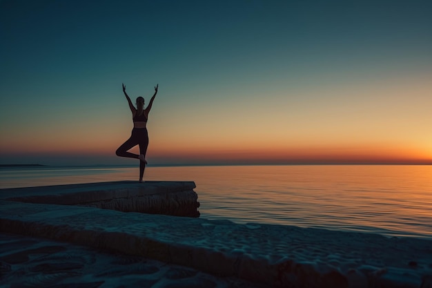 a person is standing on a rock with the sun setting behind them