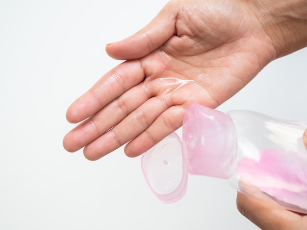 A person is washing their hands with a lotion on their fingers.