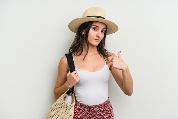 Person pointing by hand to a shirt copy space proud and confident