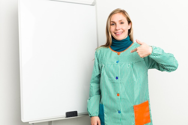 Person pointing by hand to a shirt copy space proud and confident