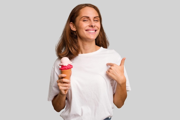 Person pointing by hand to a shirt copy space proud and confident