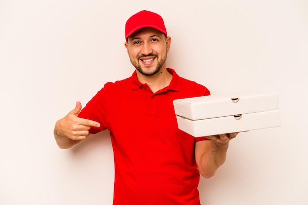 Person pointing by hand to a shirt copy space proud and confident