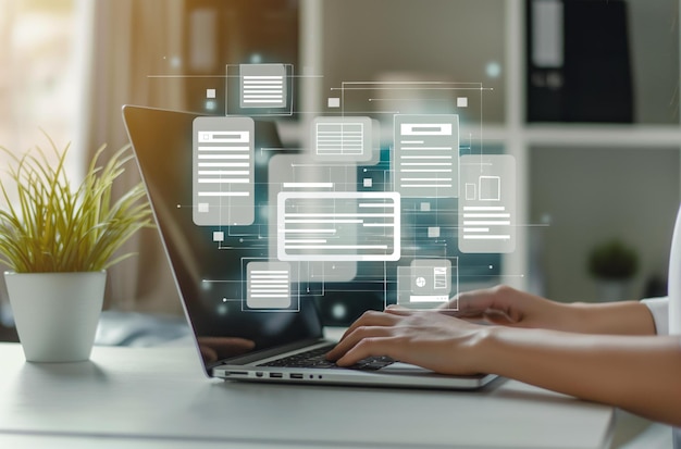 A person using a laptop with digital forms and documents floating above it