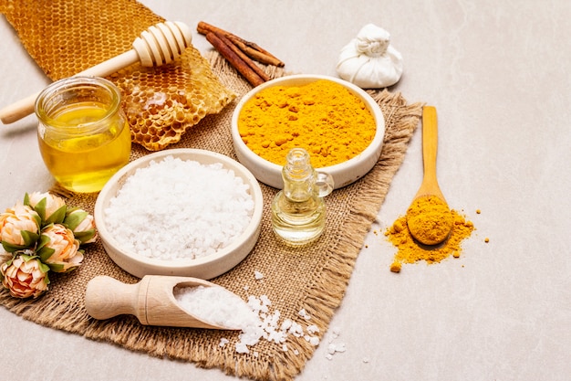 Personal care with natural ingredients. Healthy spa concept. Turmeric, sea salt, honey, cinnamon, oil.