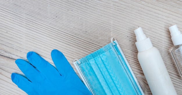 Personal protective equipment on a wooden background . photo with a copy-space