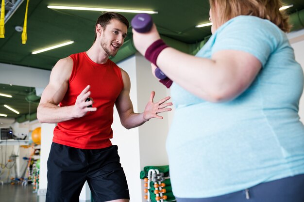 Personal Trainer Working with Client