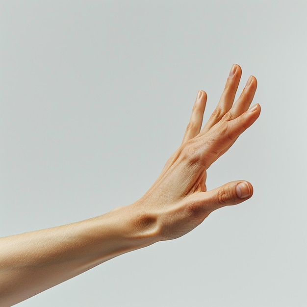 Photo a persons hand reaching up to the sky with the word quot on it