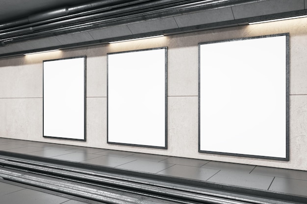 Perspective view on blank white posters on light grey wall with place for your logo or text behind rails in abstract empty underground area 3D rendering mockup