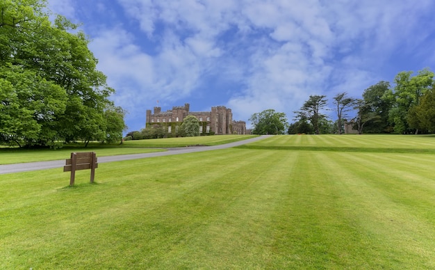 Perth, Scotland - May 25 , 2019 : Scone Palace built of red sandstone with a castellated roof, it is one of the finest examples of late Georgian Gothic style in Scotland