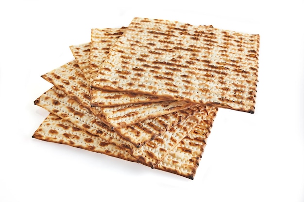 Pesach celebration concept Jewish holiday Pesach Stacked matzah isolated on white background