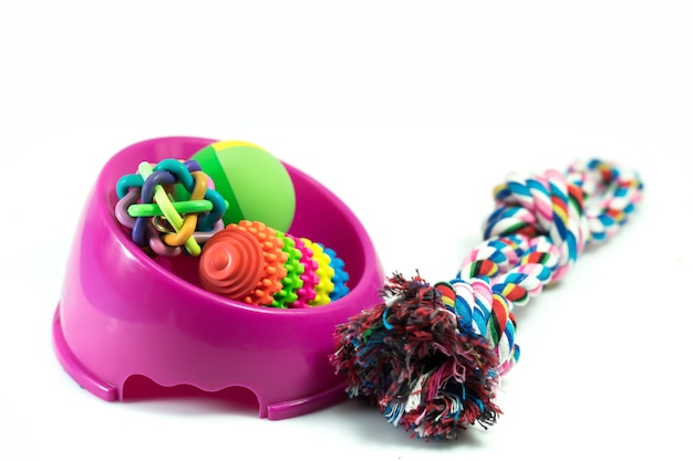 Pet supplies set about bowl, rope, rubber toys for dog or cat on white background