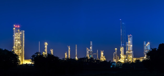 Petrochemical and petroleum plant industry with refinery stack and tank farm