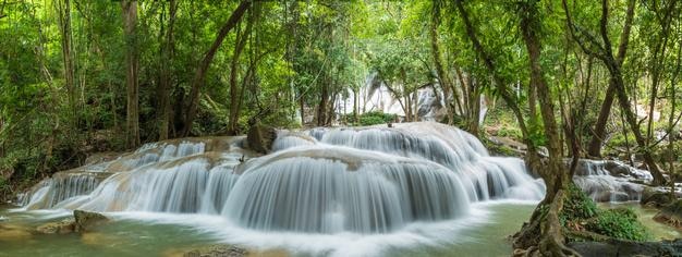 Pha Tad Waterfall famous nature travel destination in deep forest in Kanchanaburi Thailand panorama