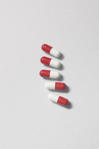 Pharmaceutical pills over white background