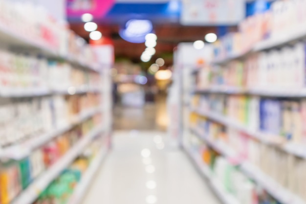 Pharmacy drugstore blur abstract background with medicine and vitamin product on shelves