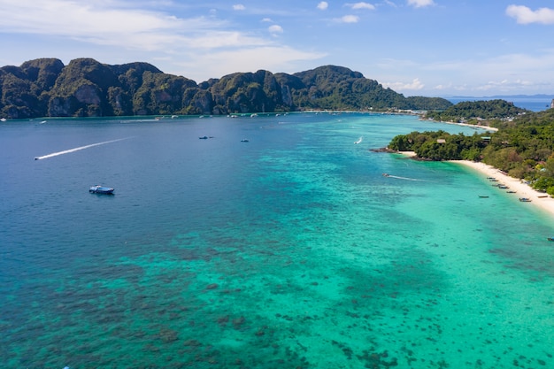 Phi phi island and  tourist boat aerial view