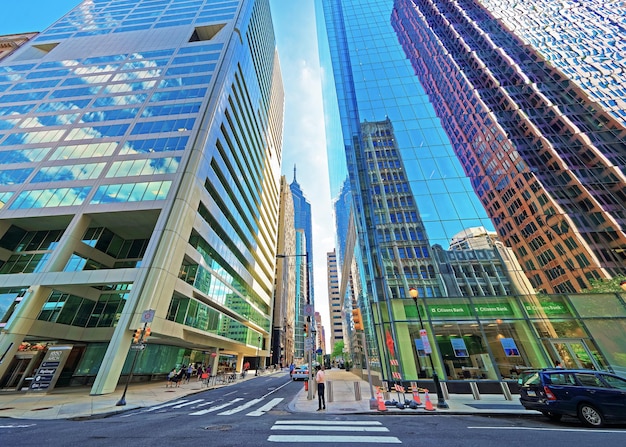 Philadelphia, USA - May 4, 2015: Arch Street view with skyscrapers reflected in glass in the City Center of Philadelphia, Pennsylvania, the USA. It is central business district in Philadelphia. Touris