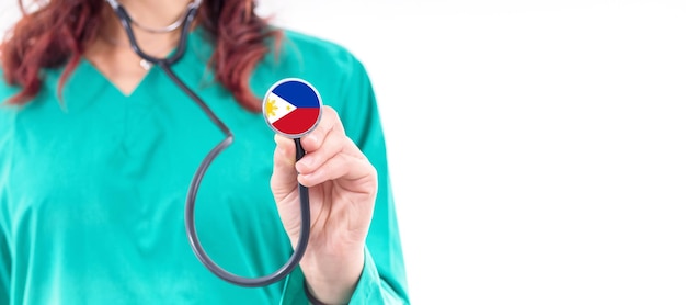 Philippines national healthcare system female doctor with stethoscope