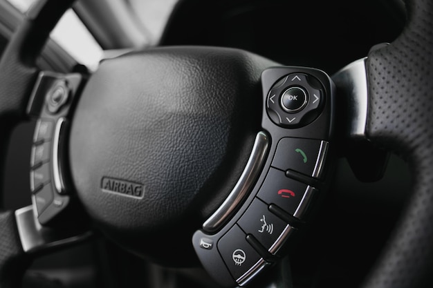 Phone buttons on the steering wheel in luxury car