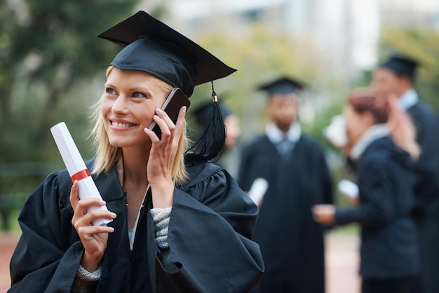 Phone call student or happy woman in graduation on campus in university school or college Outdoor education scholarship or excited graduate with mobile for talking chatting or speaking of degree