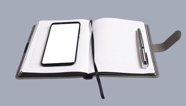 Phone mockup on business planner with pen Work app