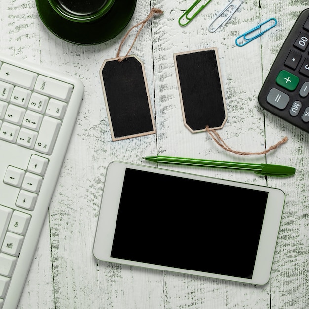 Phone With Important Message On Desk With Wood Tables And Clipboard Cellphone Screen With Crutial Announcement Calculator keyboard cup of coffee and pens