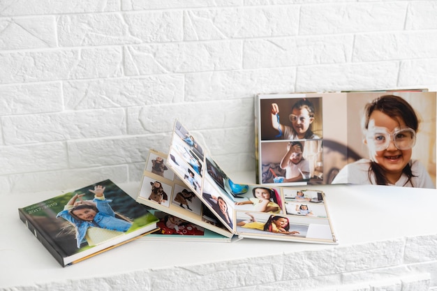 the photo album is decorated in a beautiful photobook. Presented on a white background.