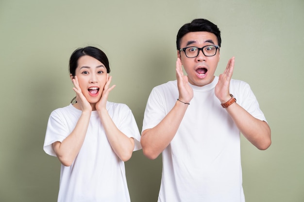 Photo of Asian couple on background