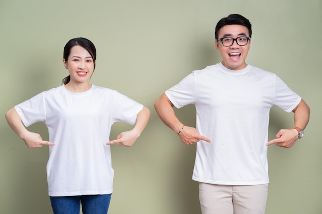 Photo of Asian couple on background