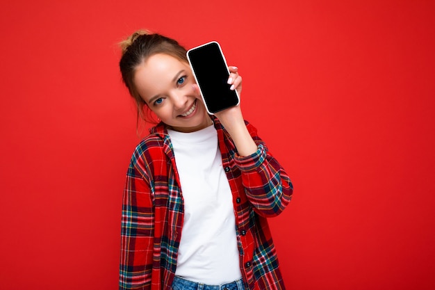 Photo of beautiful smiling young woman good looking wearing casual stylish outfit standing isolated