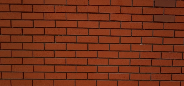 photo of beautiful vintage brick wall in house interior wide panorama of brick wall