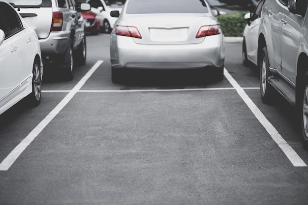 Photo photo blurred car parking lot indoors square row on the side of the building leave space empty for write text