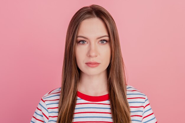 Photo of charming goregous lady calm face look camera posing on pink background