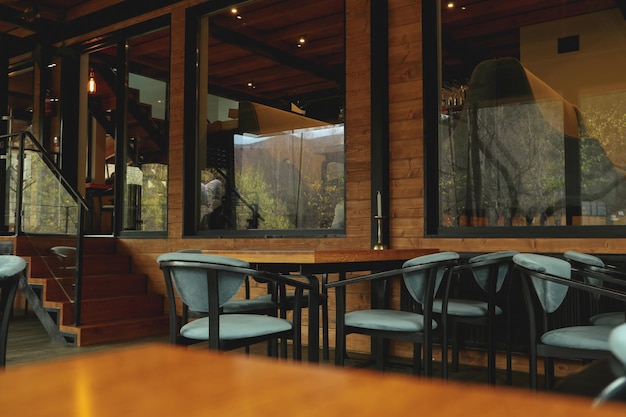 Photo of cozy wooden restaurant in mountain resort