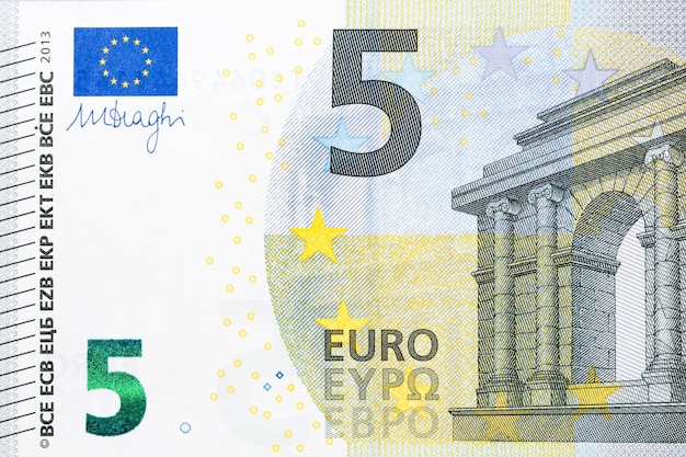 Photo of five euro banknote in macro shot. High resolution photo.