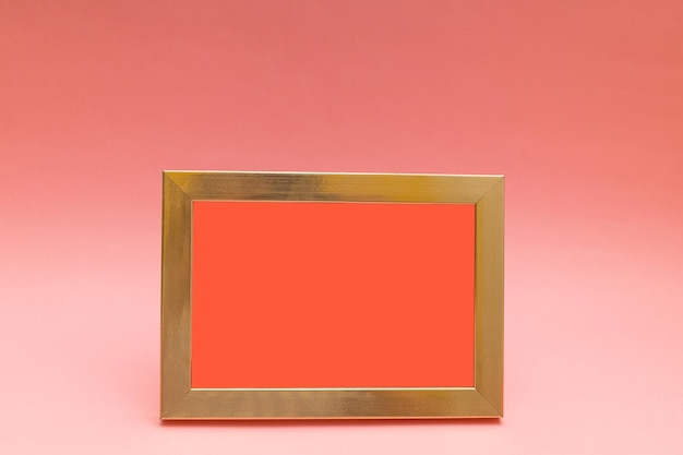 Photo frame on pink background pedmetry