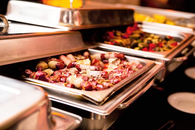 Photo of fried sausages as a snack at a buffet table