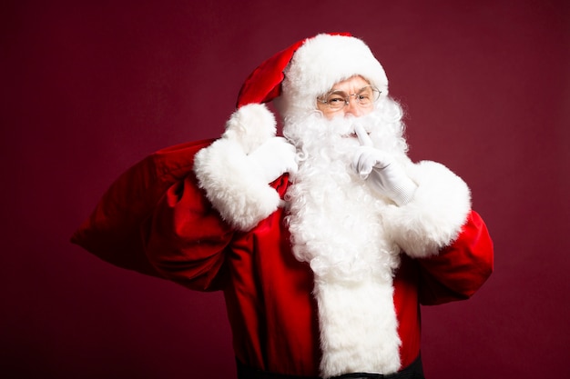 Photo of happy smiling Santa Claus is posing 