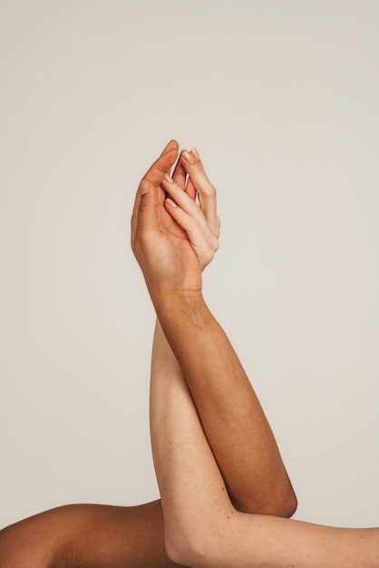 Photo of natural multiracial women hands, body positive.