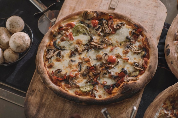 A photo of pizza with styling pizza on the table stock photo