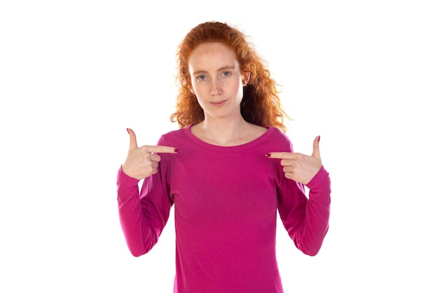 Photo portrait of red haired woman pointing herself