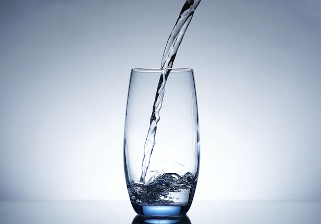 Photo pouring water into a glass