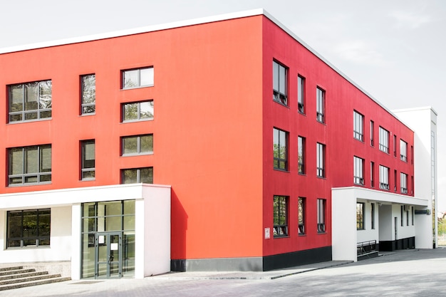 Photo of red building in modern style