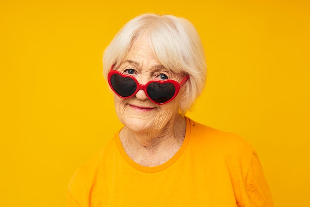 Photo of retired old lady posing face grimace joy isolated background