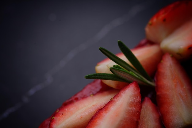 Photo of strawberry cake on a black background