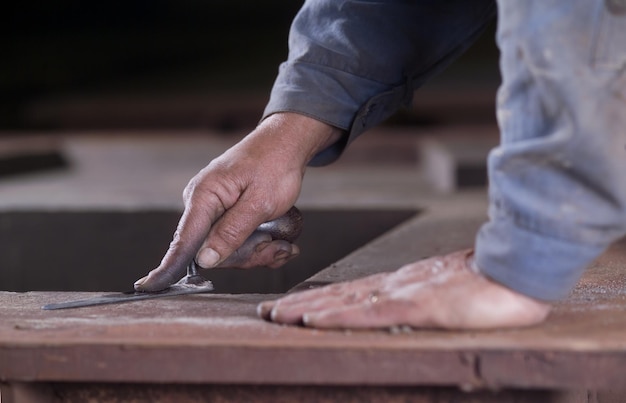 Photo of this mans hands at work during